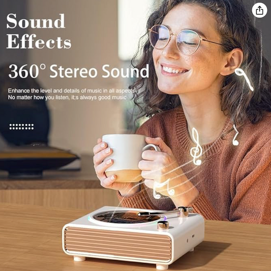 Spinova speaker showing spinning vinyl record disc while playing music