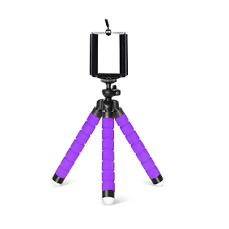 Flexible tripod used as monopod with phone clip
