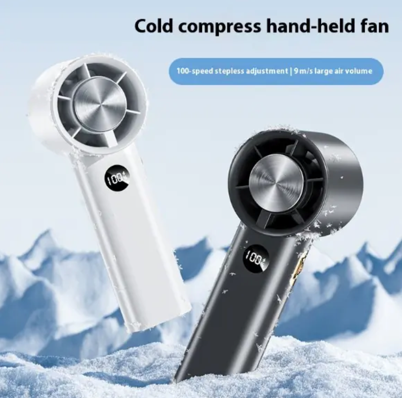 Portable turbine fan size comparison in hand